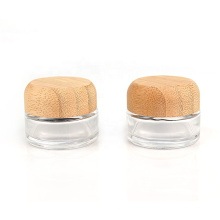 hot sale skin care luxury 25ml clear round bamboo lid glass face cream cosmetic containers